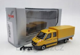 VW Crafter z plandeką zółty H0 Herpa 950459